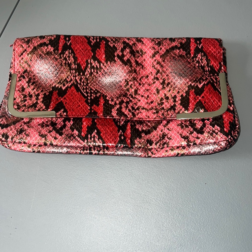 Pink and silver flap over clutch